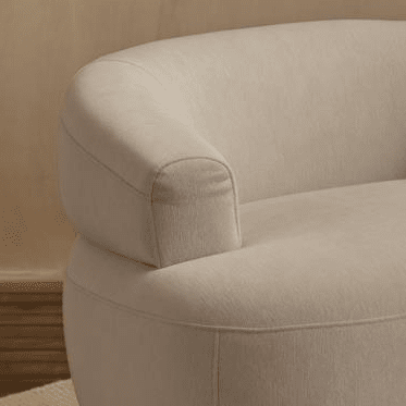 Nathalia Soft Beige Swivel Armchair - Laura James