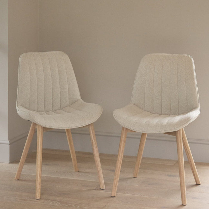 amelia-whitewash-extending-dining-set-bella-boucle-dining-chairs