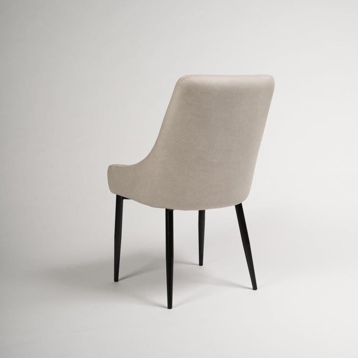 Maeve faux leather dining chairs - stone with black legs - Laura James
