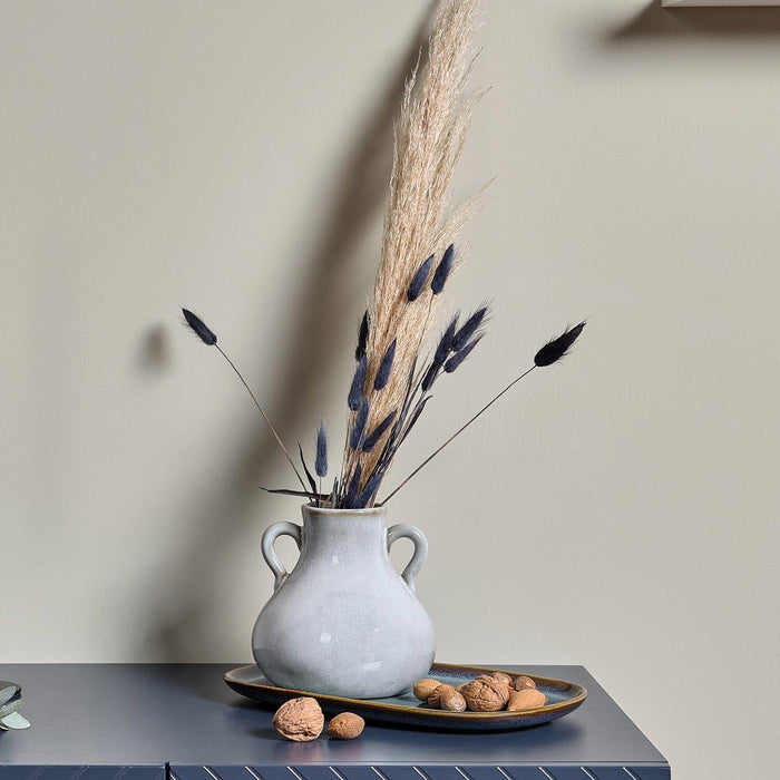 Blue ceramic vase with handles
